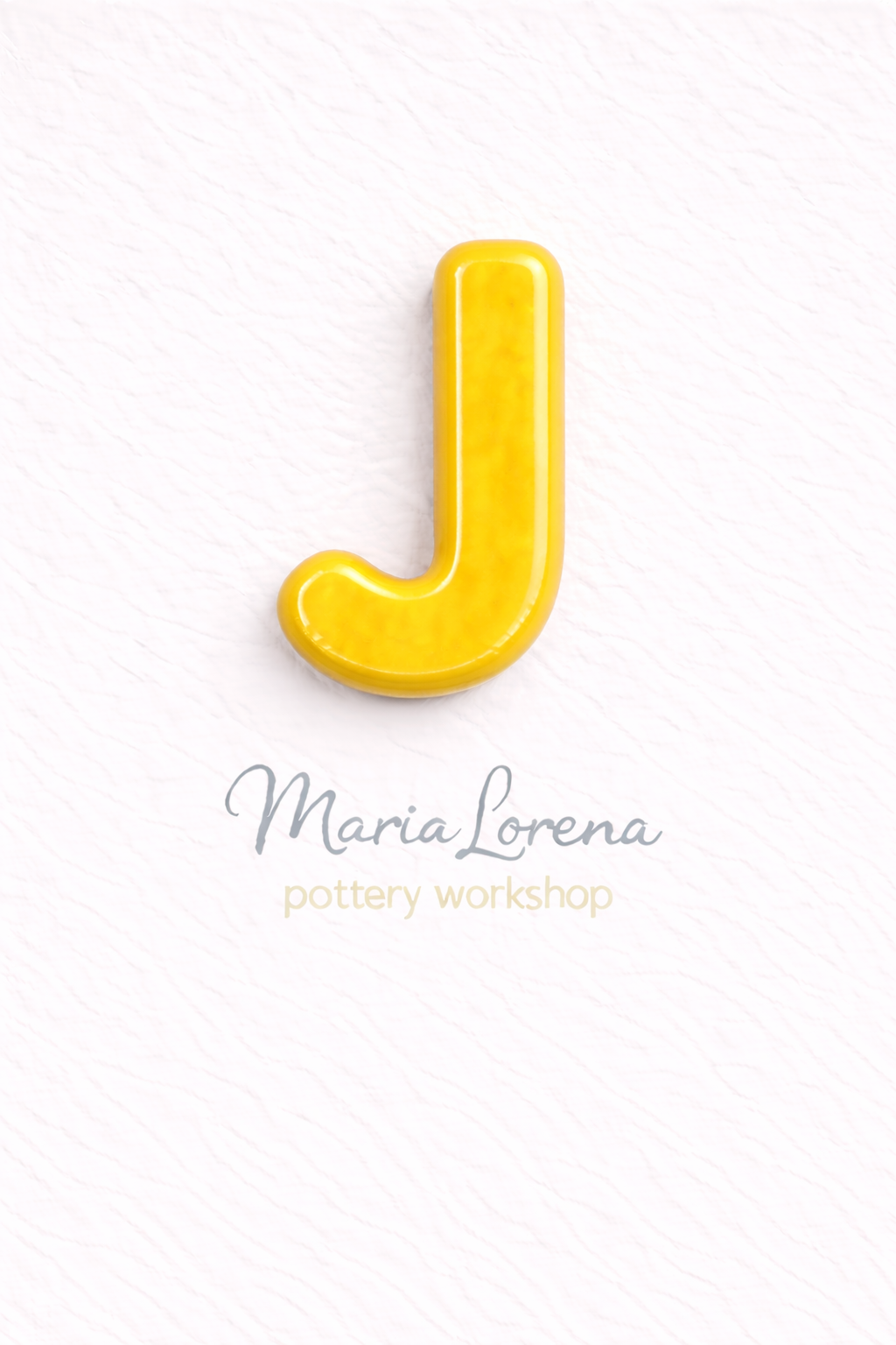 J Mayúscula amarillo
