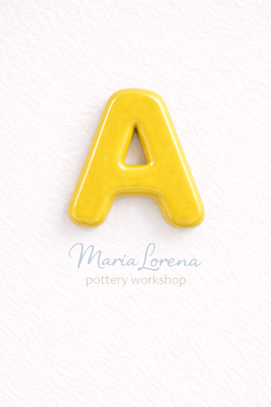 A Mayúscula amarillo