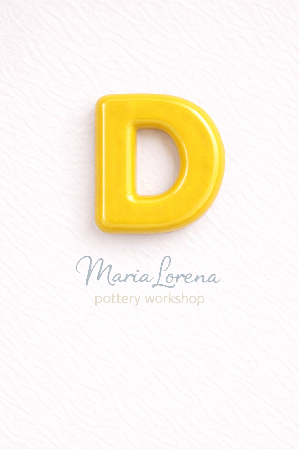 D Mayúscula amarillo