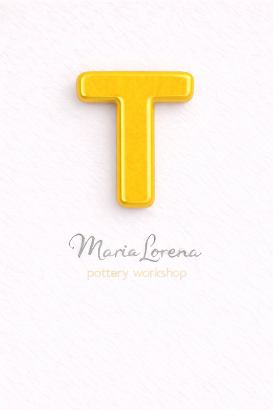 T Mayúscula amarillo